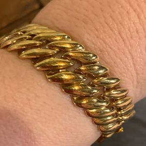 Bracelet, 8” long, 3/4 “ wide, gold, safety clasp,